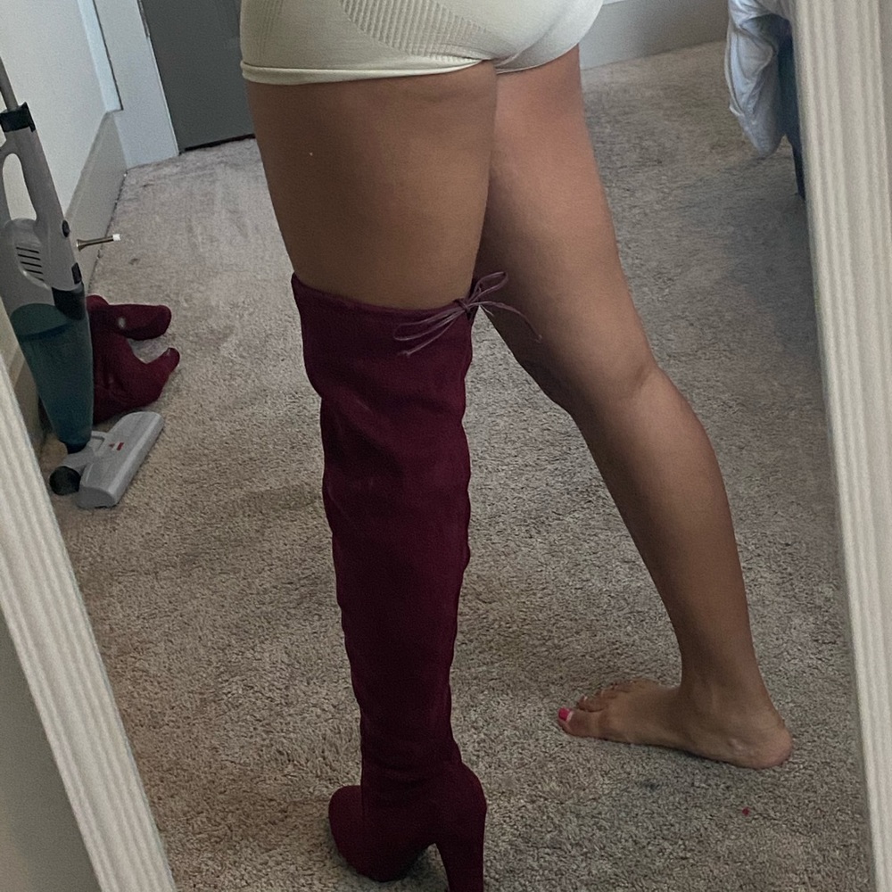 Thigh high burgundy heel boots